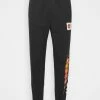 Reebok Classic LOONEY TUNES PANT - Pantalon de survêtement Réduction pantalons normale homme